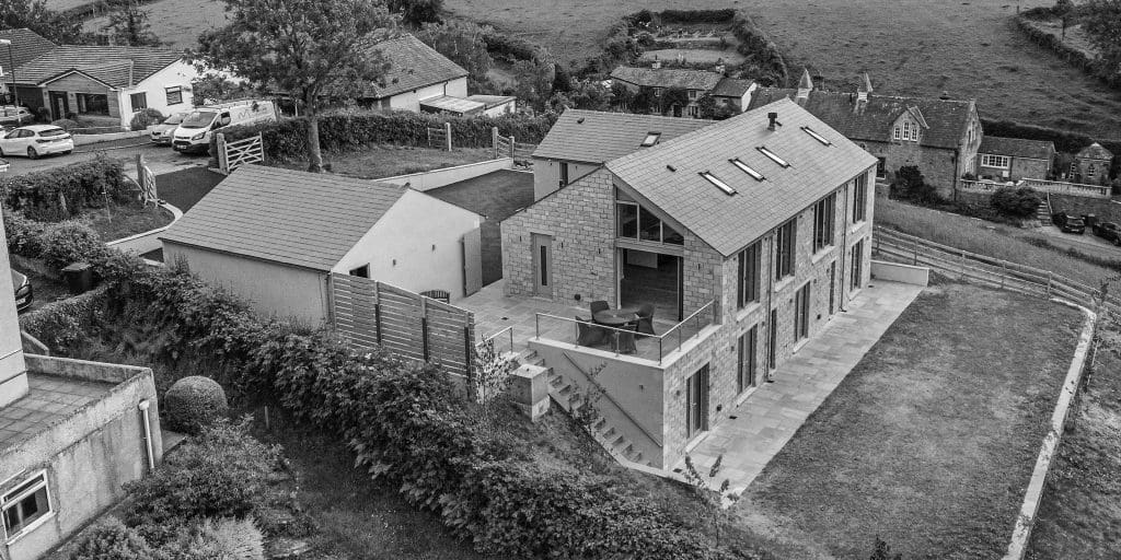 black and white modern house in countryside